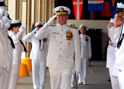 US Navy 070508-N-4965F-002 Adm. Robert F. Willard, former Vice Chief of Naval Operations, salutes as he's piped through the sideboys during a change of command ceremony