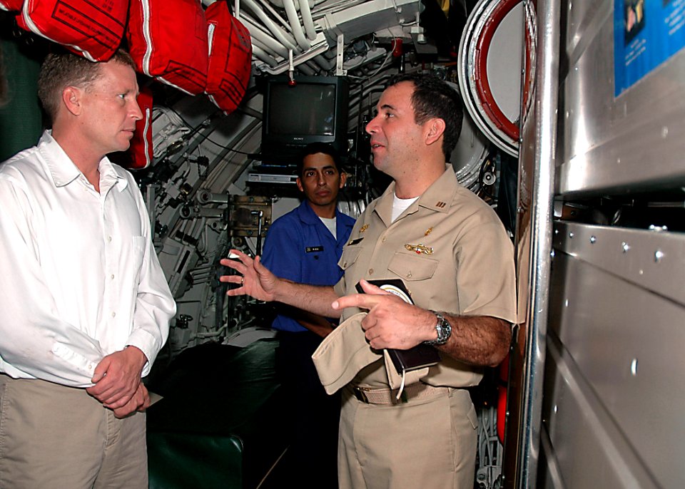 US Navy 070509-N-1522S-008 Commanding Officer of Peruvian navy submarine Chipana (SS-34), Cmdr. Alessandro Mogni, talks with Mayport Naval Station's Public Affairs Officer Bill Austin about the German-made diesel electric subma