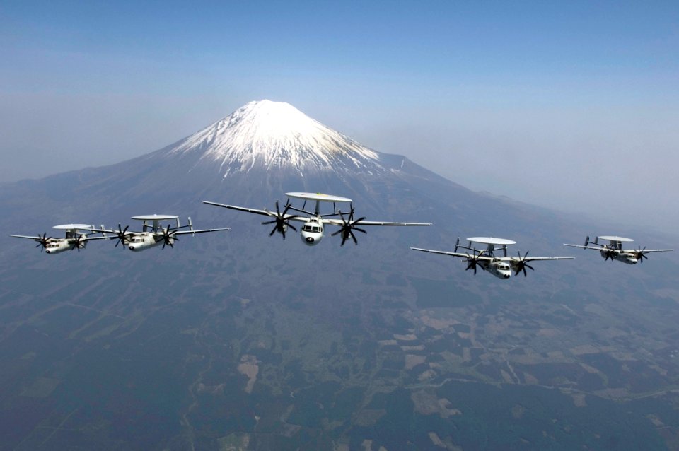 US Navy 070509-N-8591H-110 E-2C Hawkeyes assigned to the Liberty Bells, of Carrier Airborne Early Warning Squadron (VAW) 115 perform a formation flight in front of Mount Fuji