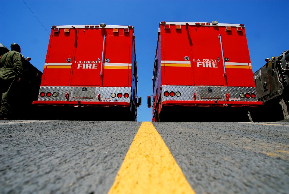 US Navy 070511-N-4774B-054 Sailors assigned to Assault Craft Unit Five (ACU) 5 assist Los Angeles County Fire Department in delivering their firefighting equipment and personnel to Catalina Island