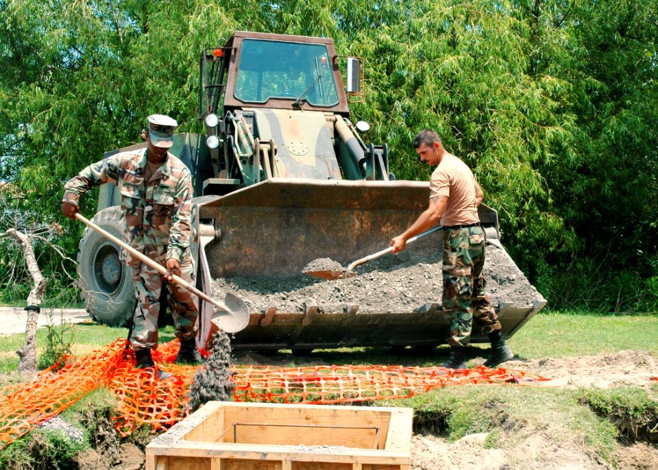 US Navy 070510-N-7427G-006 Seabees assigned to the public works department, lay the foundation for a new hurricane proof pavilion outside of the barracks on Naval Air Station, Joint Reserve Base, New Orleans