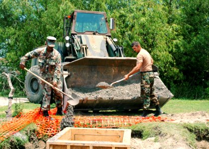 US Navy 070510-N-7427G-006 Seabees assigned to the public works department, lay the foundation for a new hurricane proof pavilion outside of the barracks on Naval Air Station, Joint Reserve Base, New Orleans