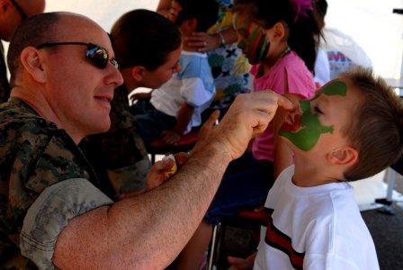 US Navy 070512-N-9604C-005 A little boy has his face painted military style at the Welcoming Arms Festival hosted by Naval Medical Center San Diego