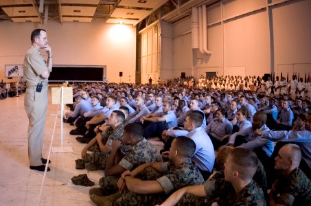 US Navy 070509-N-0696M-357 Chief of Naval Operations (CNO) Adm. Mike Mullen Master listens to a question from a Sailor assigned to Naval Air Station Pensacola, during an all hands call