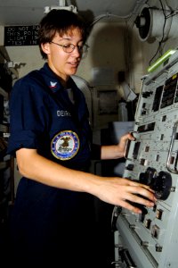 US Navy 070517-N-3038W-040 During pre-fire inspection of the Close-In Weapons System (CIWS), Fire Controlman 3rd Class Erin Devries enters computer codes on the local control panel aboard Nimitz-class aircraft carrier USS John