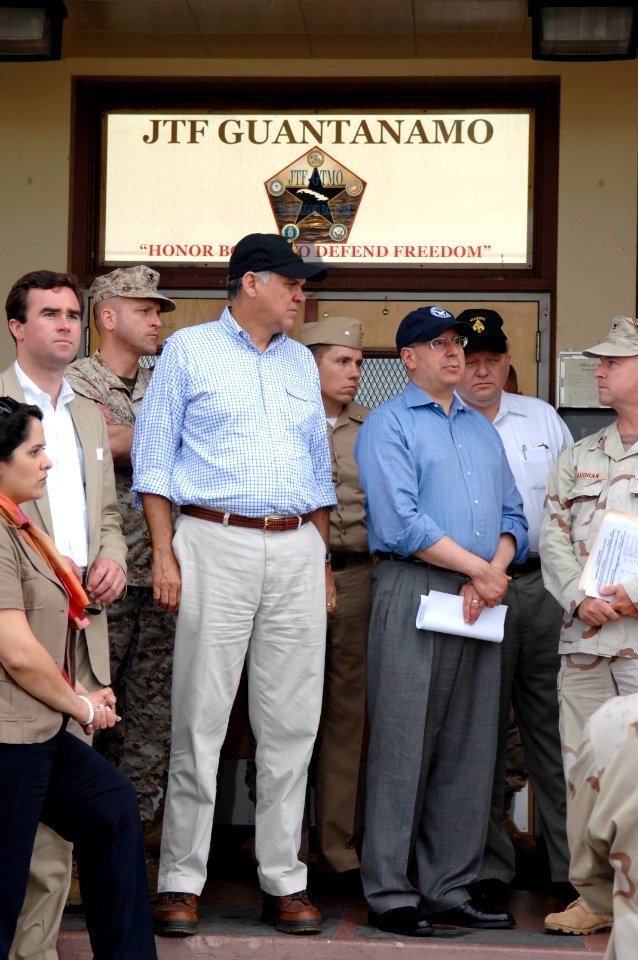 US Navy 070512-N-3642E-047 Sen. Mel Martinez and the Secretary of the Navy (SECNAV), the Honorable Dr. Donald C. Winter, listen to a brief about the safe and humane care of detained enemy combatants housed in Camp Delta