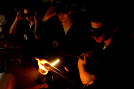 US Navy 070514-N-2659P-165 From left to right, Hull Technician Firemen Noah Rodriguez, Zach Carver and Keir Burnette assist with brazing