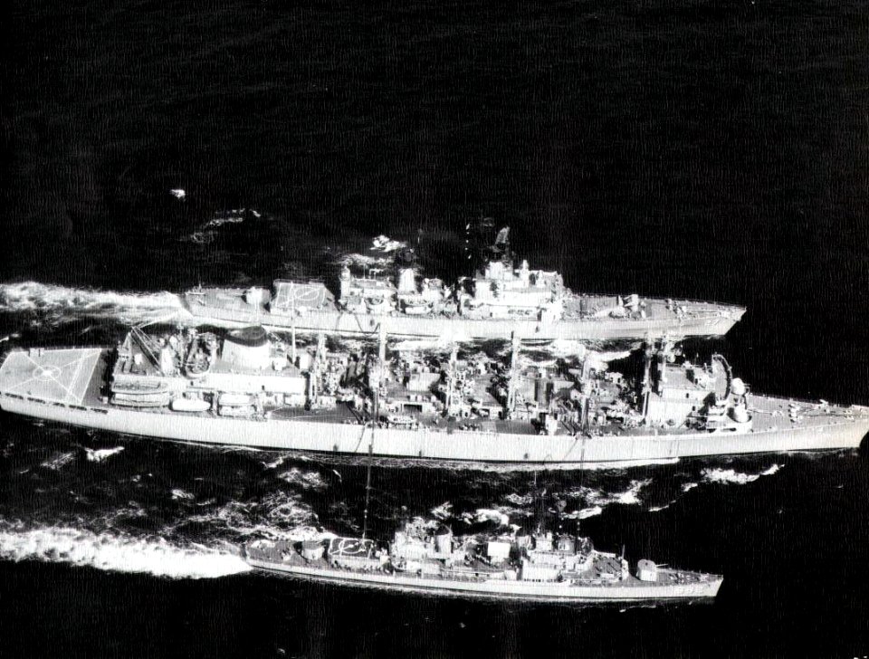 USS Detroit (AOE-4) refuels USS Josephus Daniels (DLG-27) and USS Fiske (DD-842) c1973