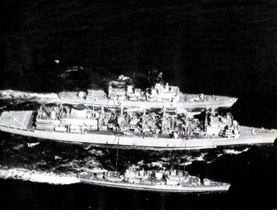 USS Detroit (AOE-4) refuels USS Josephus Daniels (DLG-27) and USS Fiske (DD-842) c1973