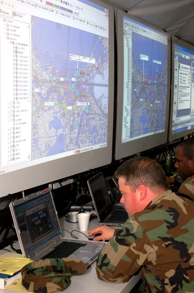 US Navy 070510-N-2456S-009 Lt. j.g. Roger Whitley, information watch officer, monitors a map of New Orleans during Navy Expeditionary Combat Command's (NECC) Echelon Exercise at Naval Amphibious Base Little Creek