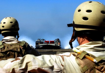 US Navy 070511-N-4163T-207 Sailors attached to Beach Master Unit (BMU) 1 stand by as a U.S. Navy Landing Craft Air Cushion (LCAC) assigned to Assault Craft Unit (ACU) 5 delivers firefighting equipment from Los Angeles County Fi photo