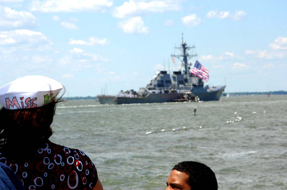 US Navy 070519-N-1713L-056 Families watch as guided missile destroyer USS Donald Cook (DDG 75) leaves Norfolk harbor