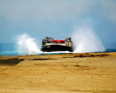 US Navy 070511-N-4774B-411 A U.S. Navy Landing Craft Air Cushion (LCAC) assigned to Assault Craft Unit (ACU) 5 deliver firefighting equipment and personnel from Los Angeles County Fire Department to Catalina Island in support o photo