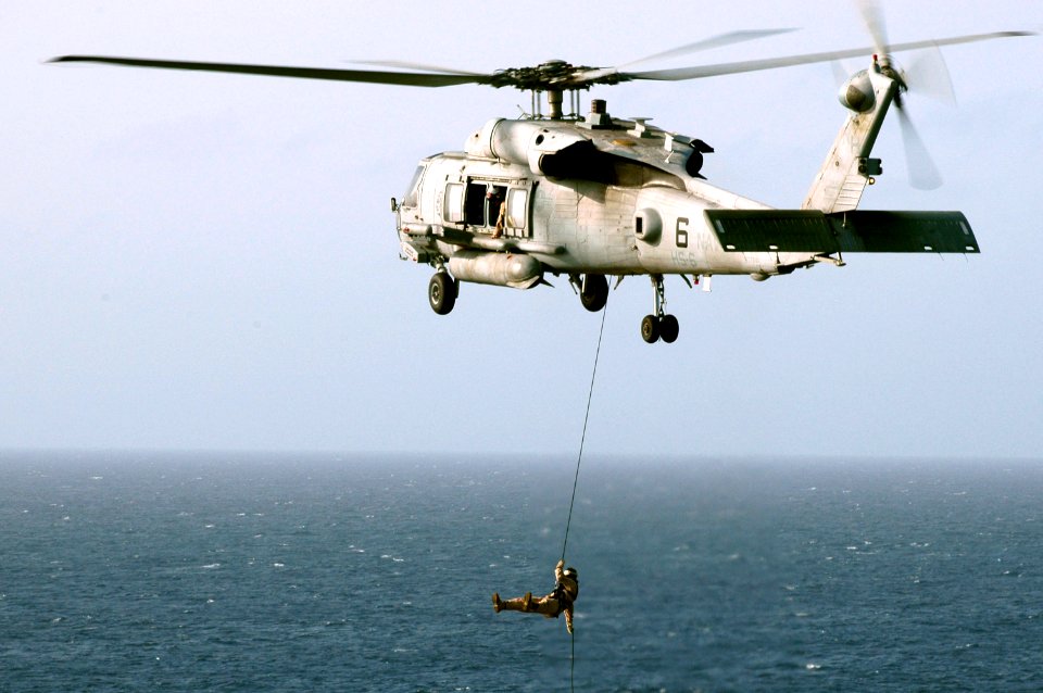 US Navy 070516-N-0890S-095 Explosive Ordinance Disposal Mobile Unit (EODMU) Detachment 3 practices fast-rope exercises from an SH-60F Seahawk assigned to the Indians of Helicopter Anti-Submarine Squadron (HS) 6 aboard nuclear-p