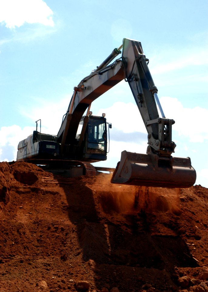 US Navy 070521-F-8678B-073 Equipment Operator 2nd Class Francis J. Villareal trains on the excavator at Robertson Barracks Driver Training Area, Australia