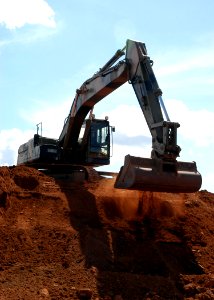 US Navy 070521-F-8678B-073 Equipment Operator 2nd Class Francis J. Villareal trains on the excavator at Robertson Barracks Driver Training Area, Australia photo