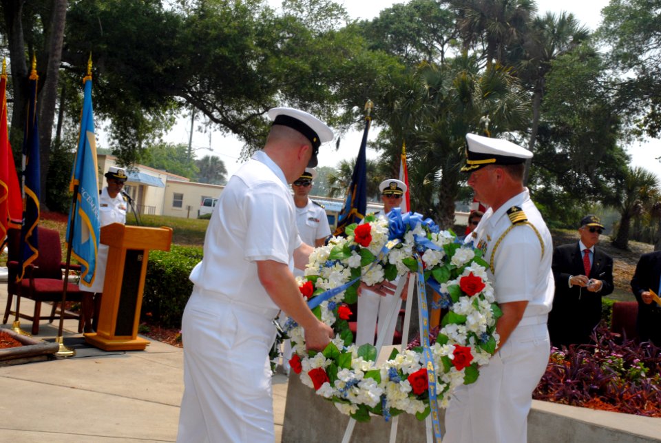 US Navy 070517-N-8102J-083 Former USS Stark (FFG 31) Sailors, Capt. Matthew Schellhorn, chief of staff, Navy Region Southeast, and Chief Intelligence Specialist Chris Ryden take part in a wreath laying during a memorial ceremon