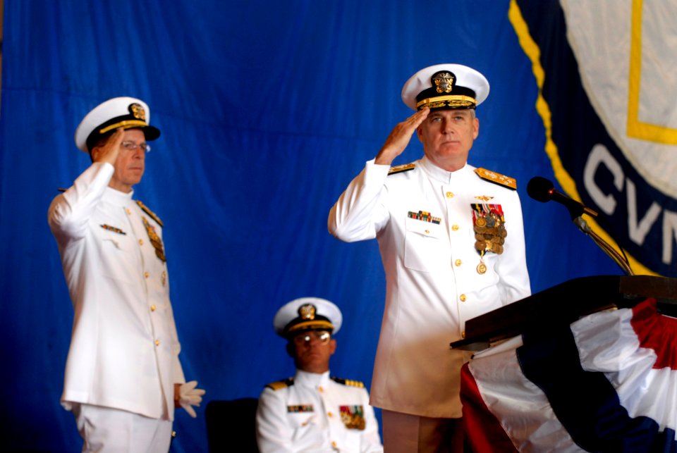 US Navy 070517-N-0696M-185 Chief of Naval Operations (CNO) Adm. Mike Mullen and former Commander, Fleet Forces Command (CFFC), Adm. John B. Nathman salute as Nathman's pennant is hauled down at the change of command cerem