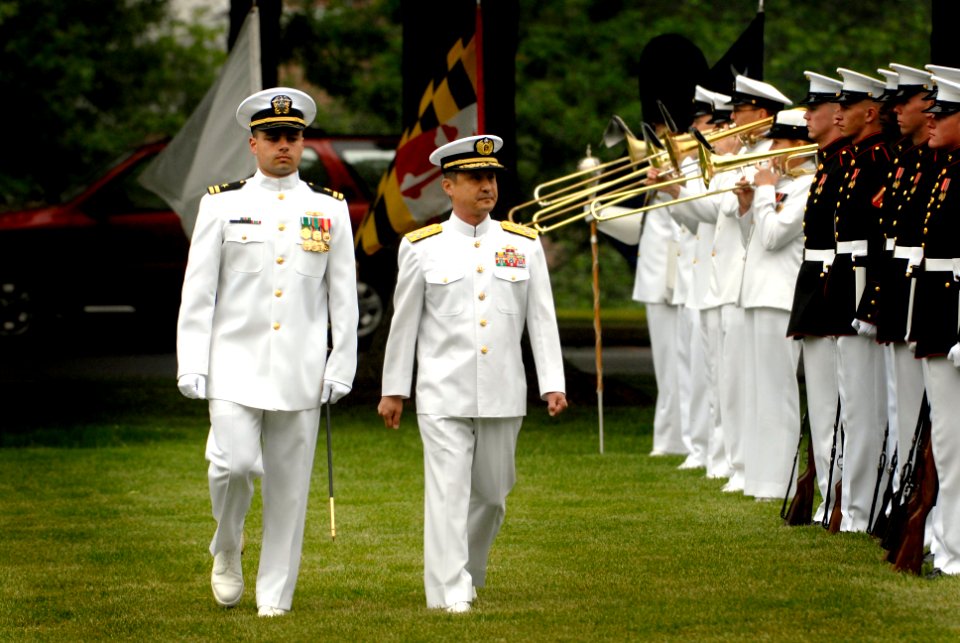 US Navy 070518-N-0696M-053 Escorted by Lt. Brandon Worl, Adm. Eiji Yoshikawa, Chief of Staff, Japan Maritime Self-Defense Force, reviews the Naval District Washington Ceremonial Guard during a full honors ceremony at Leutze Par
