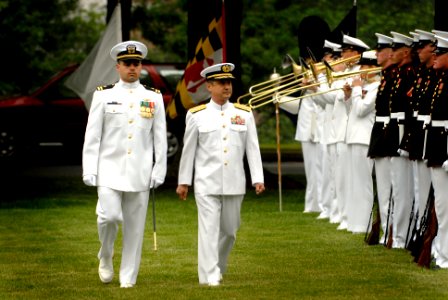 US Navy 070518-N-0696M-053 Escorted by Lt. Brandon Worl, Adm. Eiji Yoshikawa, Chief of Staff, Japan Maritime Self-Defense Force, reviews the Naval District Washington Ceremonial Guard during a full honors ceremony at Leutze Par