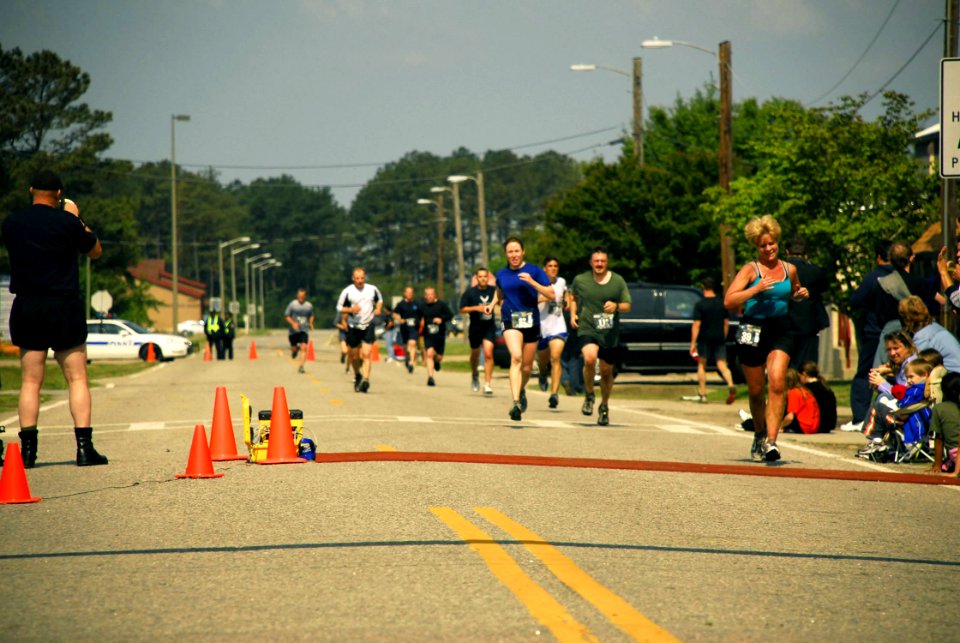 US Navy 070519-N-0193M-515 Participants sprint to the finish line during the 3rd annual Rudy Run SEAL Challenge at Naval Amphibious Base Little Creek