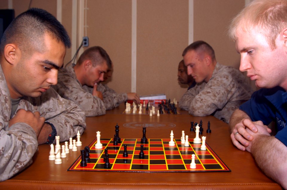 US Navy 070517-N-7955L-019 Sailors from amphibious assault ship USS Kearsarge (LHD 3) and Marines from the 22nd Marine Expeditionary Unit participate in a Morale, Welfare and Recreation sponsored chess tournament