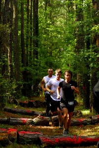 US Navy 070519-N-1688B-366 Runners navigate through the wooded portion of the third annual Rudy Run SEAL Challenge, held at Naval Amphibious Base Little Creek