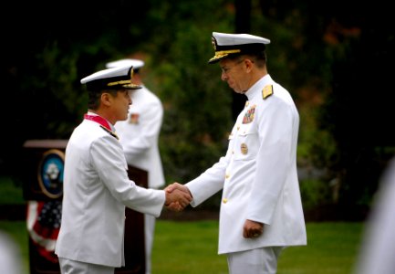 US Navy 070518-N-0696M-077 Chief of Naval Operations (CNO) Adm. Mike Mullen welcomes Adm. Eiji Yoshikawa, Chief of Staff, Japan Maritime Self-Defense Force with a full honors ceremony at Leutze Park on board Washington Navy Yar