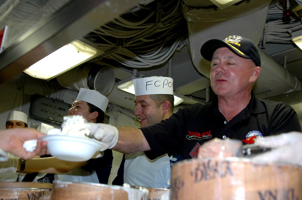 US Navy 070516-N-7128A-069 Former NASCAR driver Geoff Bodine serves ice cream with the First Class Petty Officer Association during an ice cream social aboard nuclear-powered aircraft carrier USS Nimitz (CVN 68)