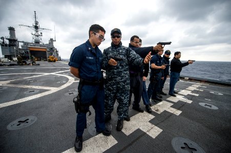 USS Denver sailors conduct small-arms qualification 140424-N-ZU025-007