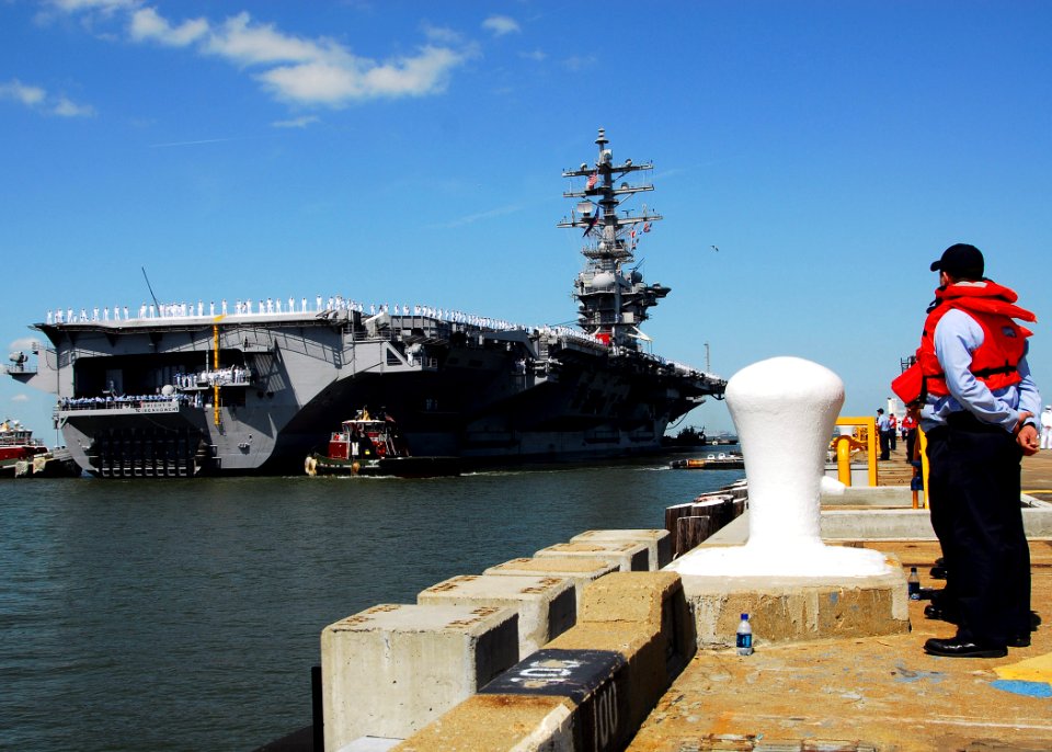 US Navy 070523-N-7241L-100 Sailors assigned to Nimitz-class aircraft carrier USS Dwight D. Eisenhower (CVN 69) return to Naval Station Norfolk after the longest deployment by a carrier strike group since 2003