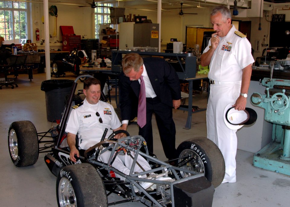 US Navy 070524-N-8497H-023 Lt. Cmdr Steve Zip of the Office of Community Outreach tests the fit on the new car