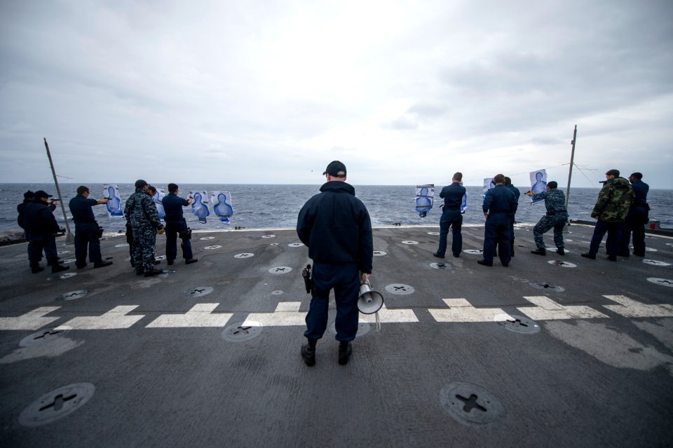 USS Denver sailors conduct small-arms qualification 140424-N-ZU025-065