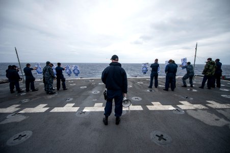 USS Denver sailors conduct small-arms qualification 140424-N-ZU025-065
