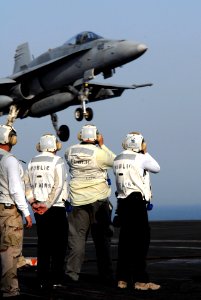 US Navy 070525-N-5484G-093 Members of the Dutch and German press document flight operations aboard nuclear-powered aircraft carrier USS Nimitz (CVN 68)