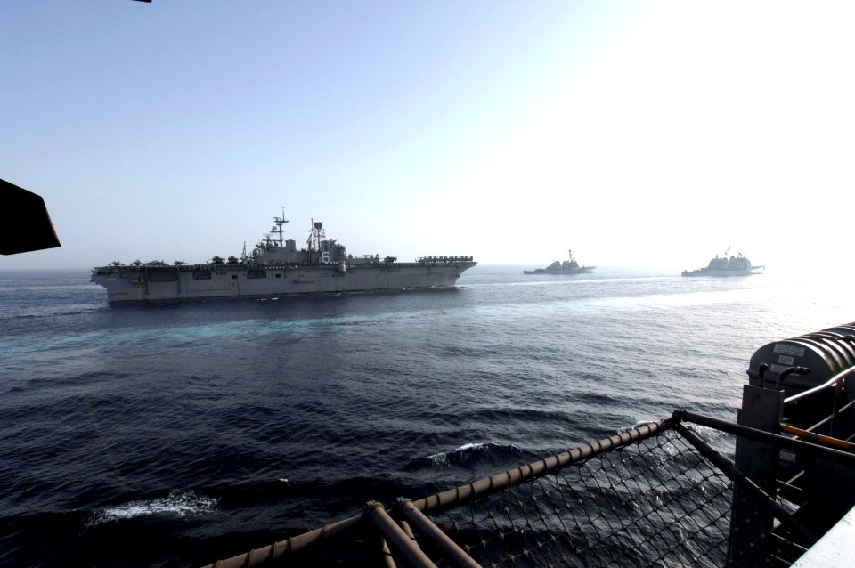 US Navy 070522-N-3729H-079 Nimitz-class aircraft carrier USS John C. Stennis (CVN 74), nuclear-powered aircraft carrier USS Nimitz (CVN 69), and amphibious assault ship USS Bonhomme Richard (LHD 6) transit the Gulf of Oman