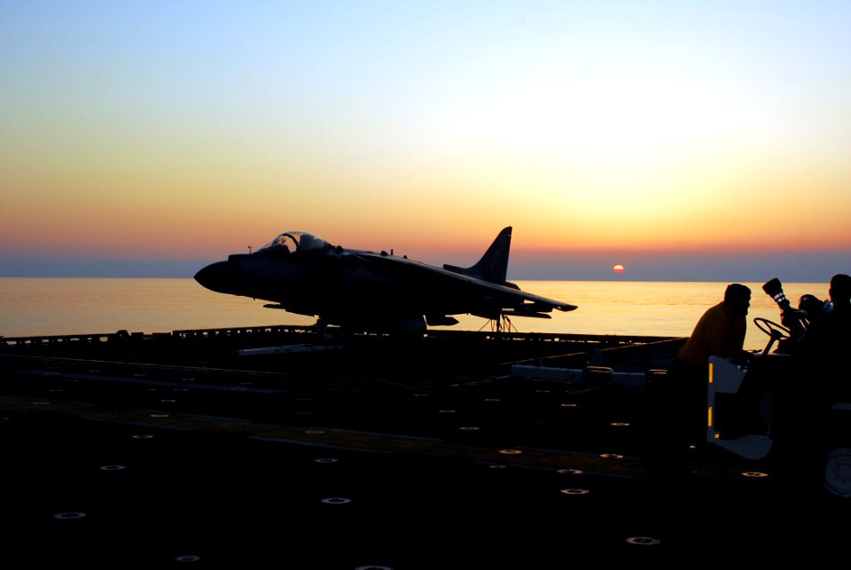 US Navy 070521-N-5307M-001 The sun sets on an AV-8B Harrier II from Marine Medium Helicopter Squadron (HMM) 26 after flight operations come to an end