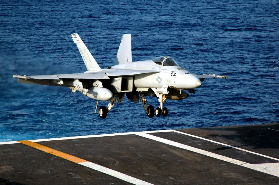 US Navy 070523-N-5387K-009 An F-A-18E Super Hornet, assigned to Strike Fighter Squadron (VFA) 27, lands on the flight deck of aircraft carrier USS Kitty Hawk (CV 63)