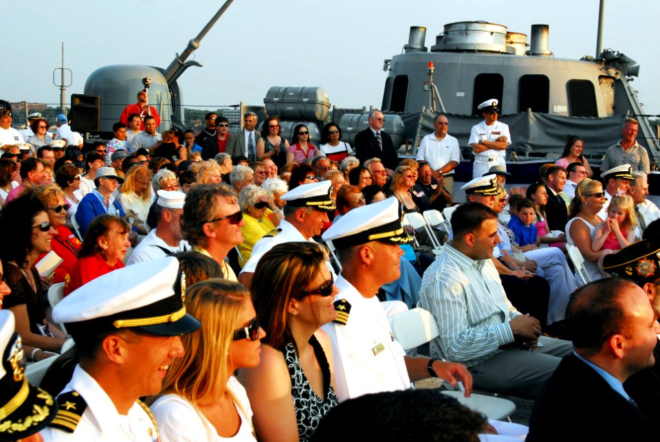 US Navy 070526-N-5758H-283 Sea service members and Staten Island locals laugh at comments made by the master of ceremony during a Sunset Parade aboard guided-missile cruiser USS Hue City (CG 66), as part of the festivities for