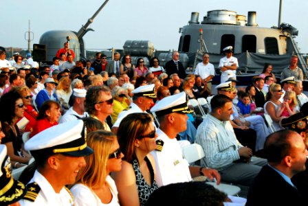 US Navy 070526-N-5758H-283 Sea service members and Staten Island locals laugh at comments made by the master of ceremony during a Sunset Parade aboard guided-missile cruiser USS Hue City (CG 66), as part of the festivities for