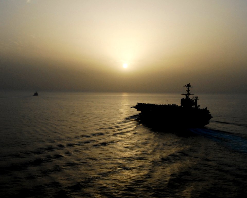 US Navy 070522-N-8157C-049 USS John C. Stennis (CVN 74) transit through the Gulf of Oman at sunset