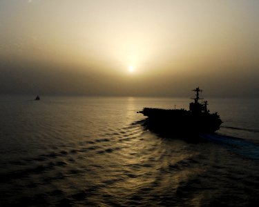 US Navy 070522-N-8157C-049 USS John C. Stennis (CVN 74) transit through the Gulf of Oman at sunset