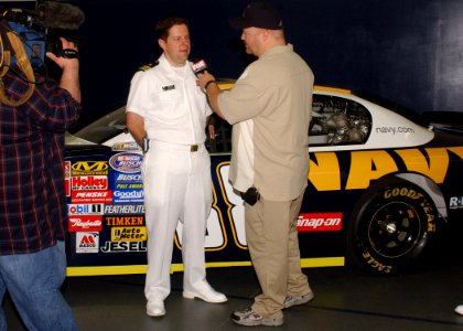 US Navy 070523-N-8497H-029 Jon Wilson from FOX News Rising interviews Lt. Cmdr Steve Zip assigned to the Navy Office of Community Outreach (NAVCO)