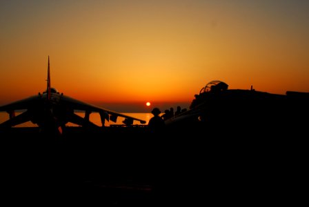 US Navy 070521-N-5307M-002 The sun sets on an AV-8B Harrier II from Marine Medium Helicopter Squadron (HMM) 26 after flight operations