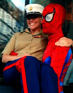 US Navy 070523-N-8923M-390 Cpl. Candace Mattox smiles as she poses with Spider-man on the streets in downtown Manhattan