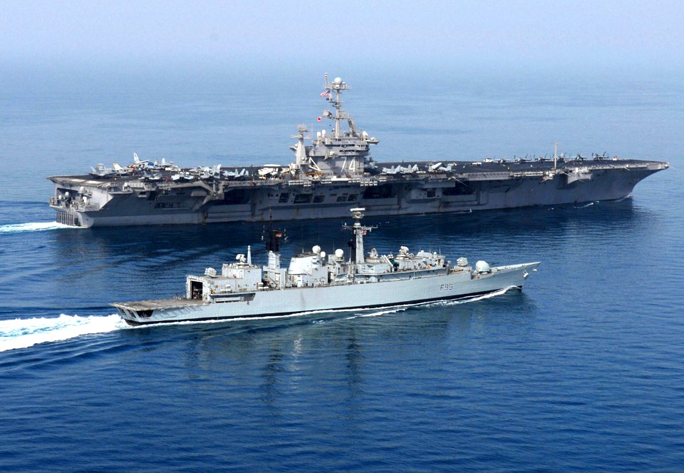 US Navy 070529-N-0684R-089 British frigate HMS Cornwall (F 99) approaches Nimitz-class aircraft carrier USS John C. Stennis (CVN 74) to provide plane guard support to the carrier during flight operations