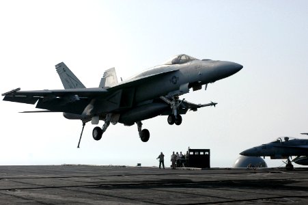 US Navy 070524-N-0890S-008 An F-A-18E Super Hornet assigned to the Tophatters of Strike Fighter Squadron (VFA) 14 lands on the flight deck of the nuclear-powered aircraft carrier USS Nimitz (CVN 68)