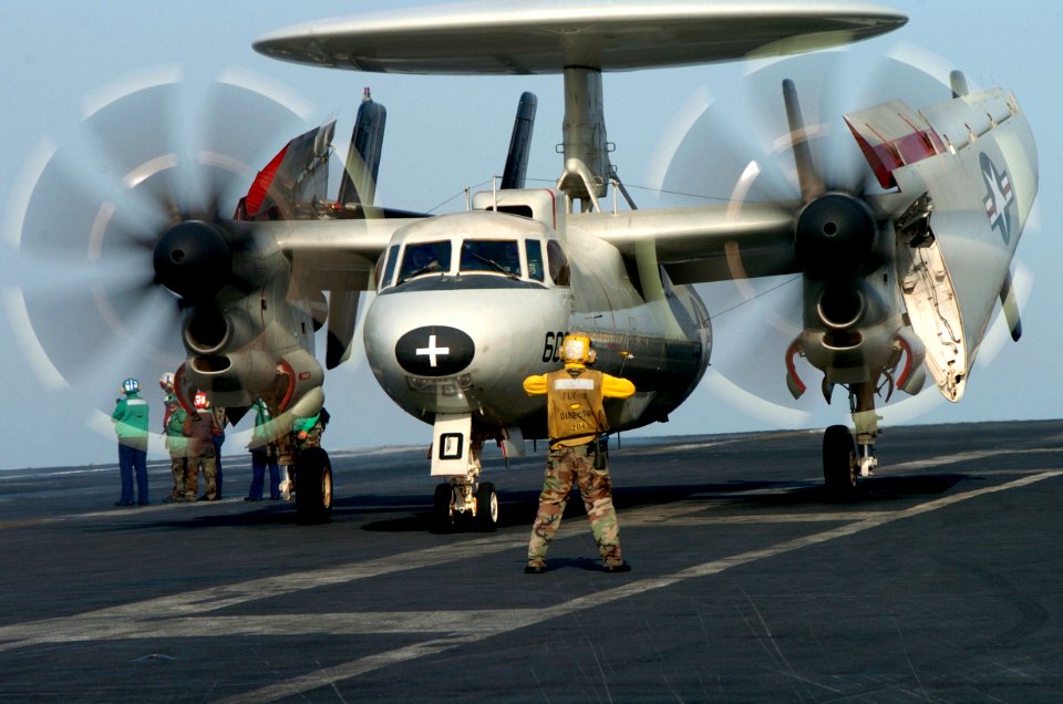 US Navy 070524-N-4420S-069 Aviation Boatswain's Mate 3rd Class Jerry Bickings taxies an E-2C Hawkeye, aboard USS Nimitz (CVN 68)