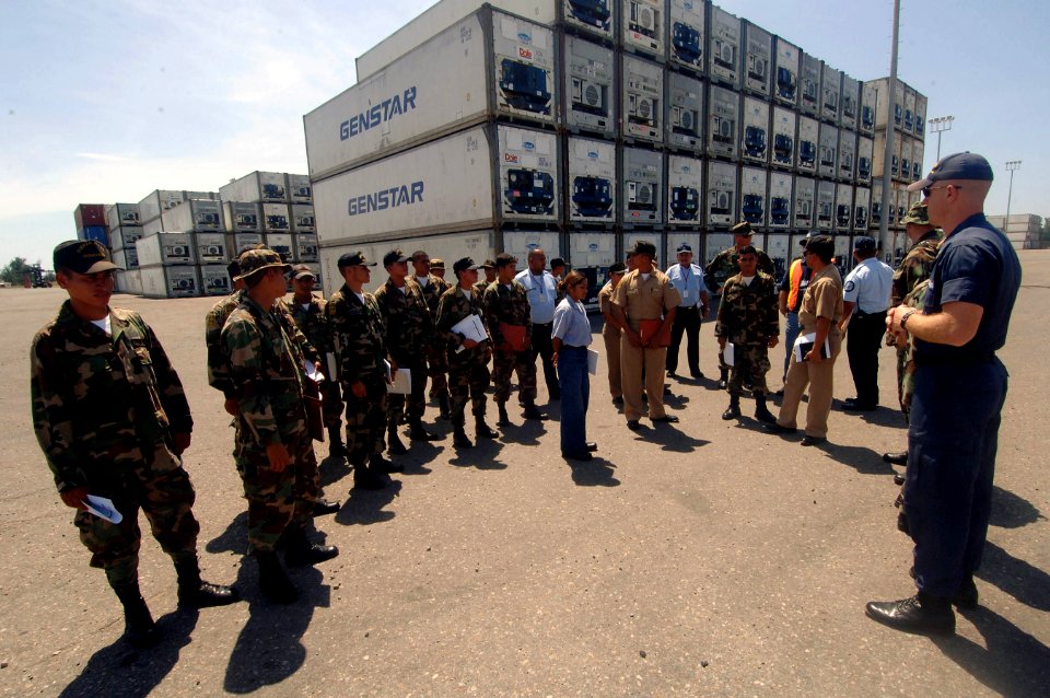 US Navy 070522-N-0989H-008 BM2 Thomas Williams of the U.S. Coast Guard International Training Division conducts a port vulnerability walk-thru with Honduran sailors