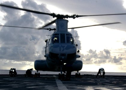 US Navy 070601-N-6710M-013 A CH-46 Sea Knight lands on the flight deck of USS Tortuga (LSD 46) during deck landing qualifications as the ship transits through Pioneer Channel